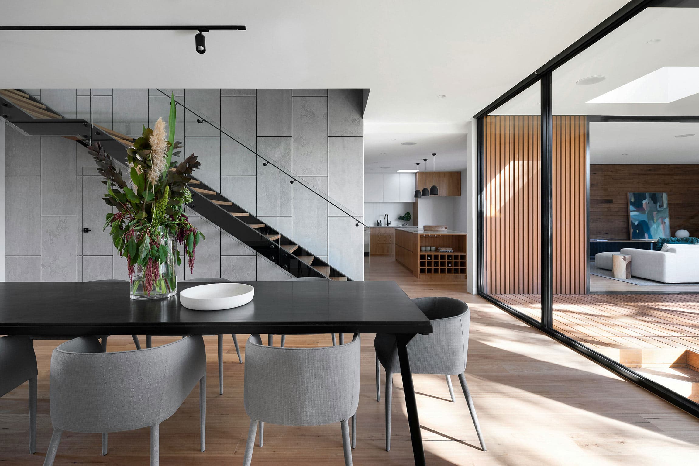 Refined modern architecture framed against a clear sky